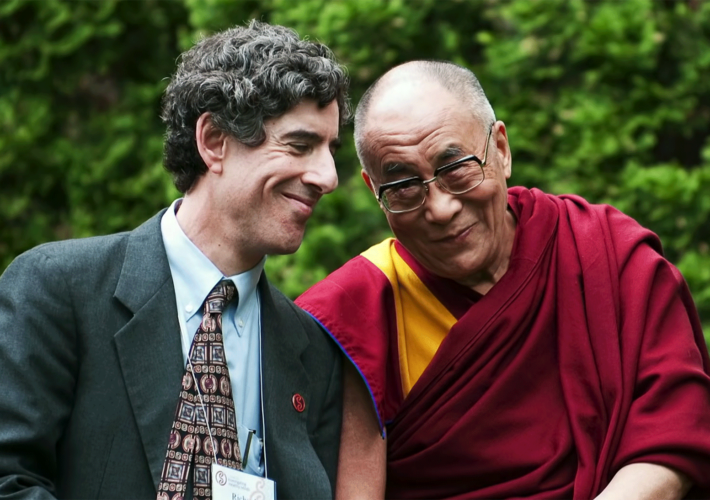 Dr Richard Davidson sits with His Holiness The 14th Dalai Lama at the Weisman Center in Madison, Wisconsin