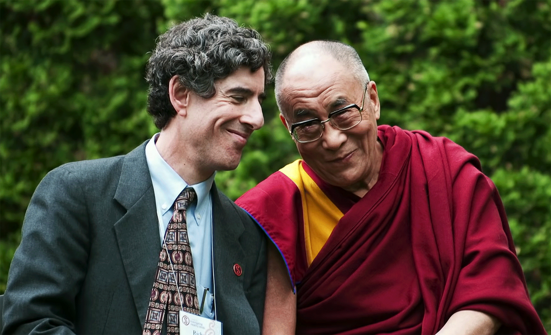 Dr Richard Davidson sits with His Holiness The 14th Dalai Lama at the Weisman Center in Madison, Wisconsin